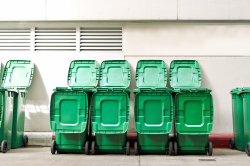 Recycling bins organized for proper waste segregation